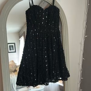 Strapless black mini dress